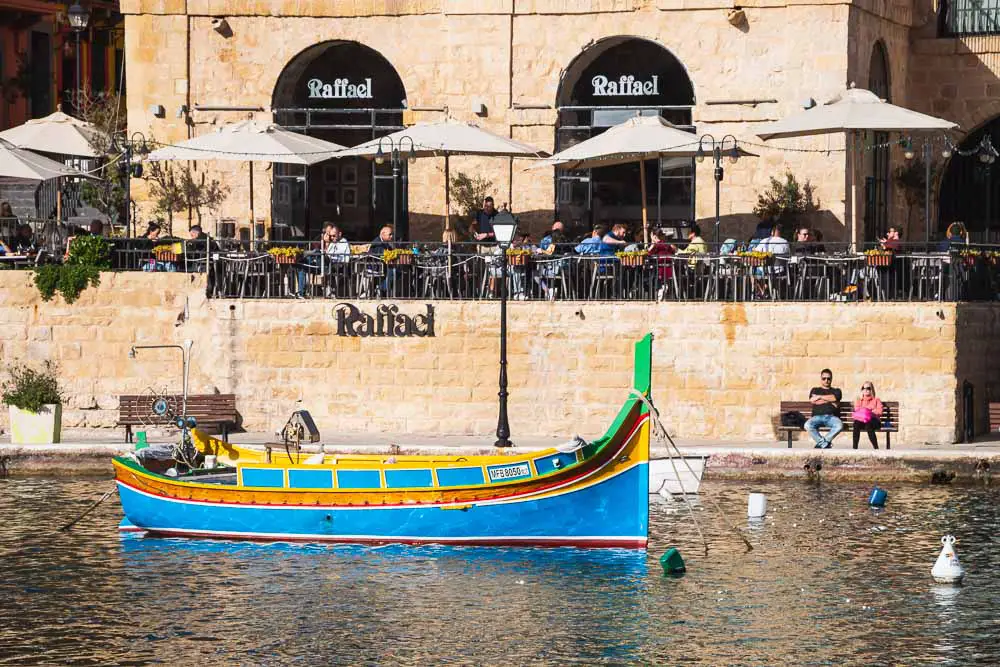 Luzzu Boot in St Julians im Winter in Malta Luzzu Boot in St Julians im Winter in Malta